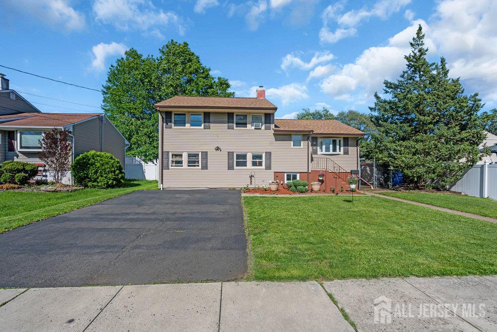 73 Webb Drive Fords, NJ 08863 - Photo 54 of 65 a view of house with outdoor space and garden