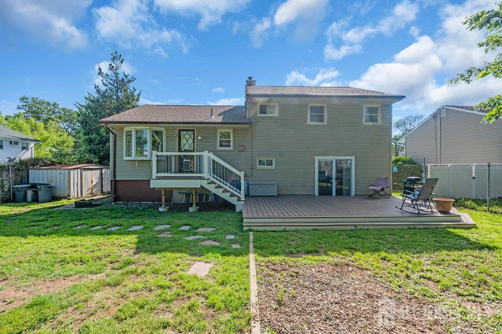 73 Webb Drive Fords, NJ 08863 - Photo 59 of 65 a view of a house with a yard porch and sitting area