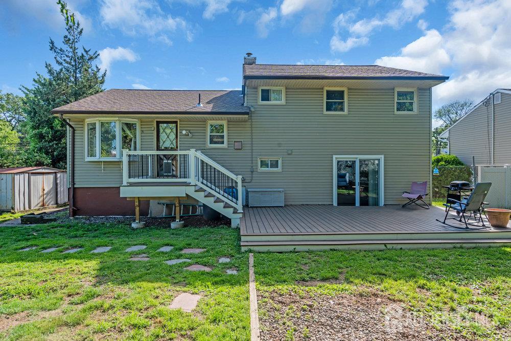 73 Webb Drive Fords, NJ 08863 - Photo 60 of 65 a view of a house with a yard porch and sitting area