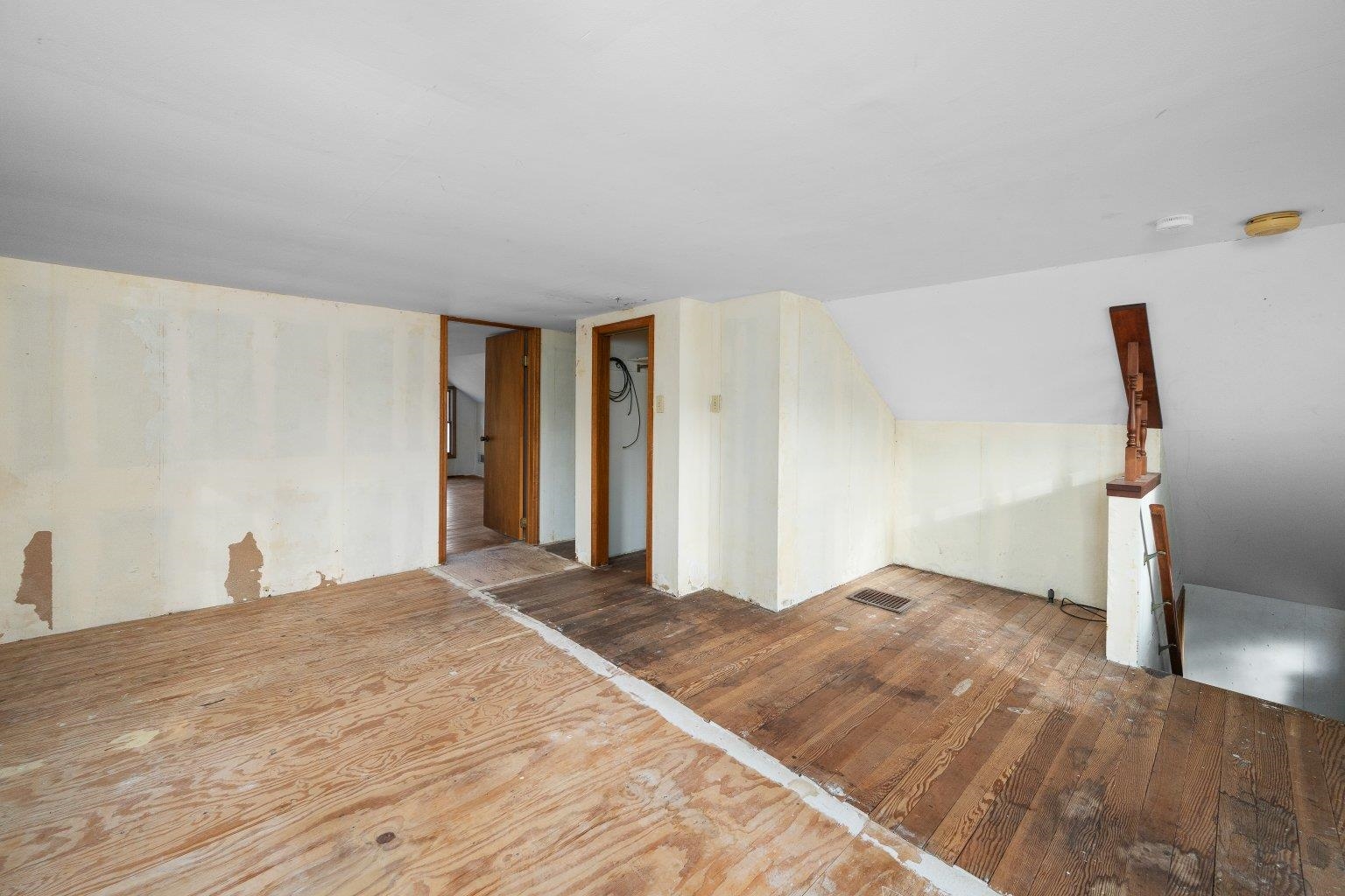 5108 6th Avenue Moline, IL 61265 - Photo 14 of 23 a view of a livingroom with wooden floor and a refrigerator