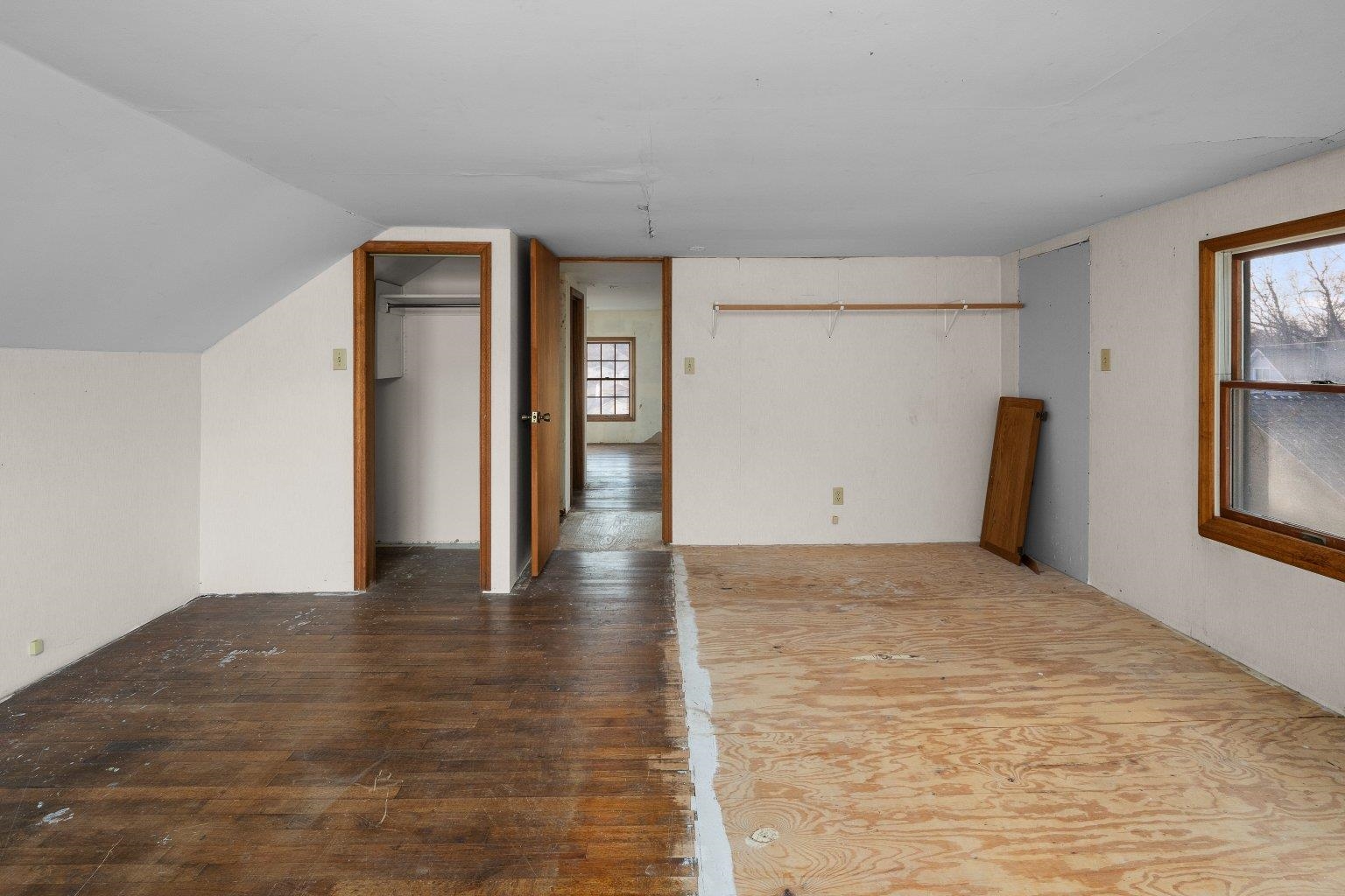 5108 6th Avenue Moline, IL 61265 - Photo 17 of 23 a view of an empty room with window and wooden floor