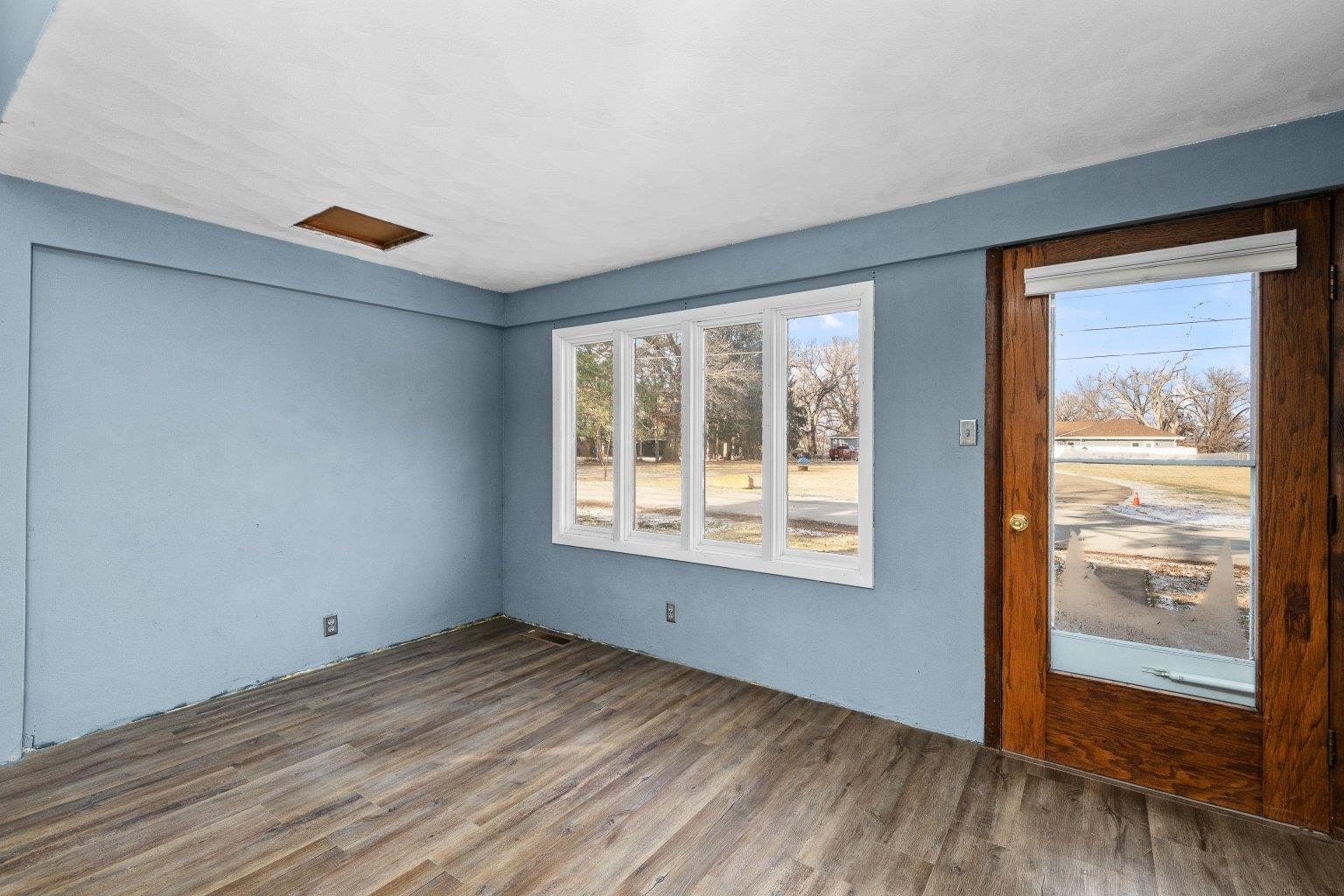 5108 6th Avenue Moline, IL 61265 - Photo 6 of 23 a view of empty room with wooden floor and fan