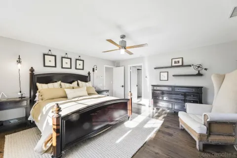 a bed room with a bed and a fireplace