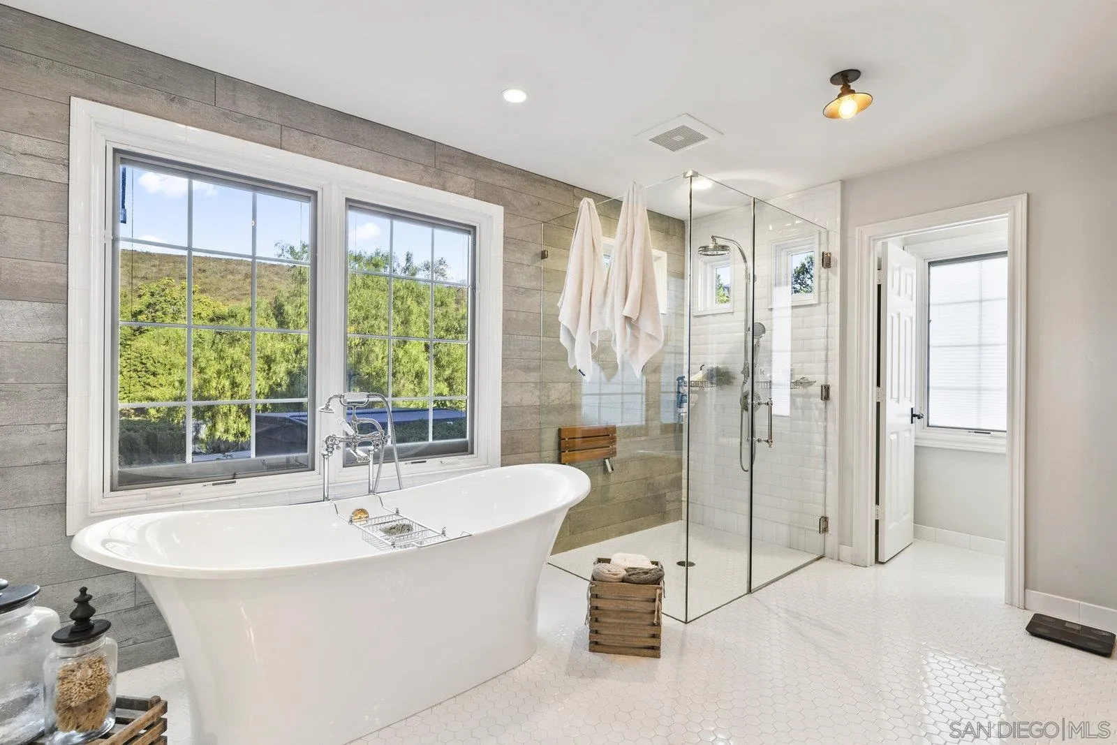 20455 Elfin Forest Road Escondido, CA 92029 - Photo 27 of 50 a spacious bathroom with a tub shower and windows