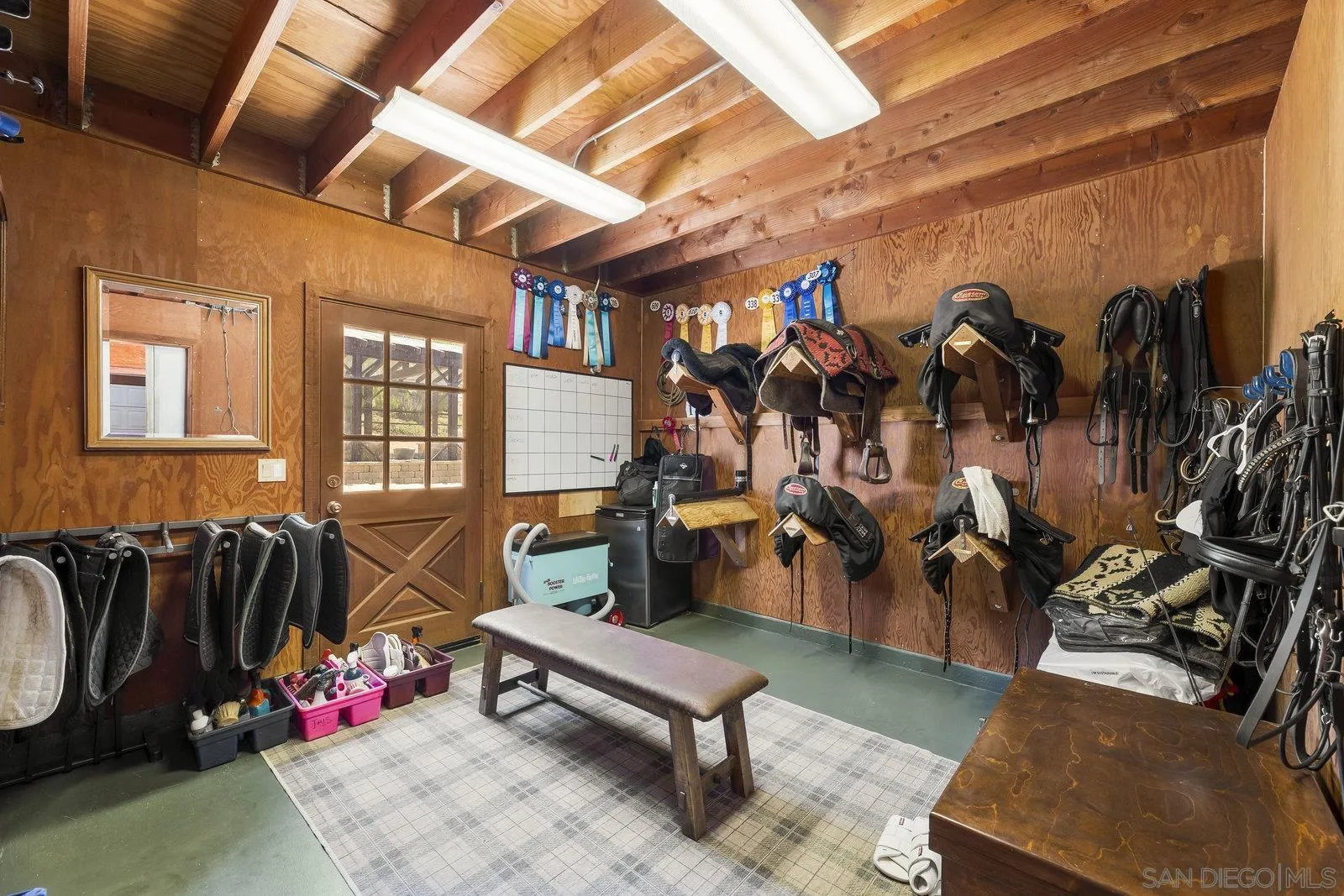 20455 Elfin Forest Road Escondido, CA 92029 - Photo 38 of 50 a living room with gym equipment and a mirror