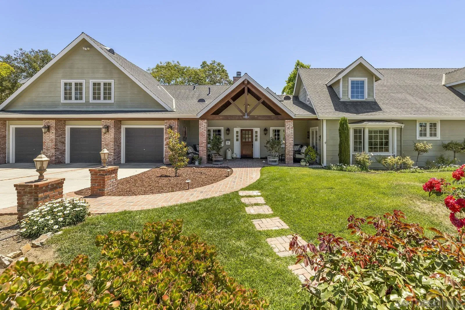 20455 Elfin Forest Road Escondido, CA 92029 - Photo 48 of 50 a front view of a house with a yard and potted plants