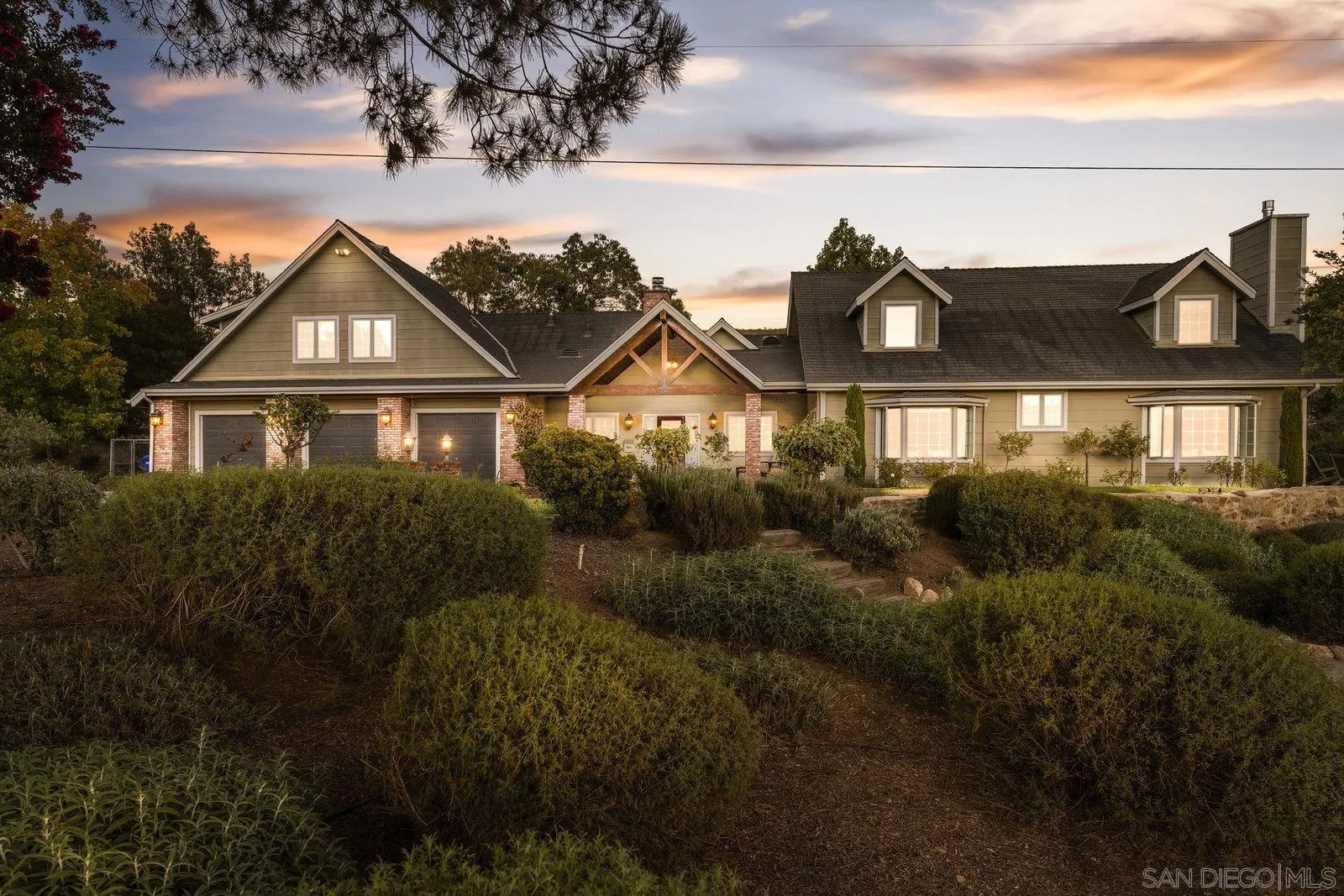 20455 Elfin Forest Road Escondido, CA 92029 - Photo 5 of 50 a view of a big house with a big yard and potted plants