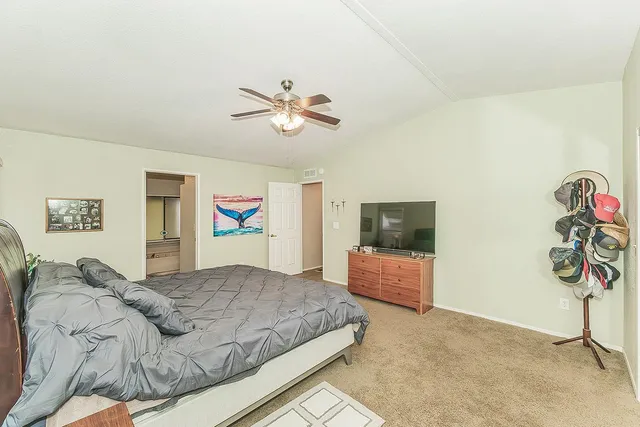 a spacious bathroom with a double vanity sink mirror and a