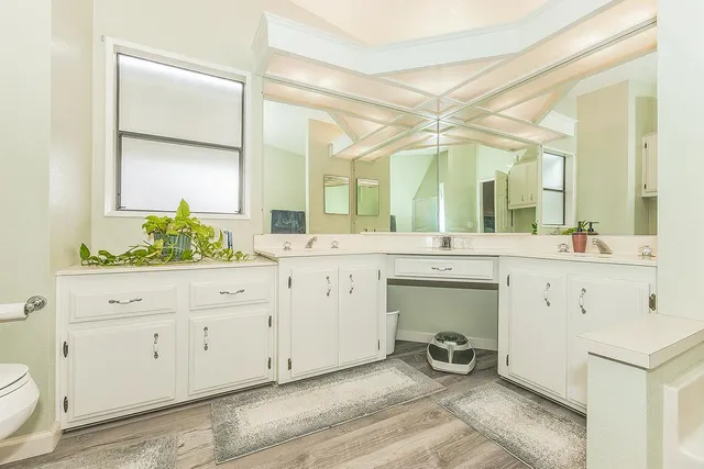 a bathroom with a tub and a shower