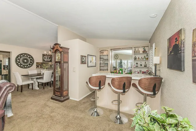 a living room with furniture and a table
