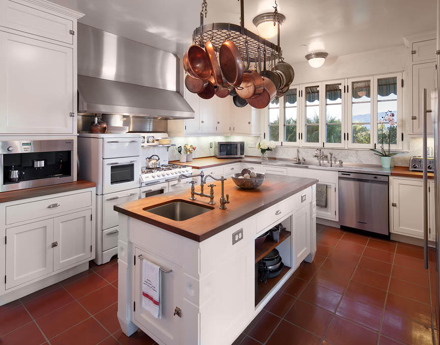 695 Via Hierba Santa Barbara, CA 93110 - Photo 11 of 29 a kitchen that has a lot of cabinets in it