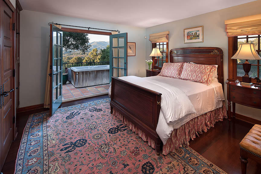 695 Via Hierba Santa Barbara, CA 93110 - Photo 19 of 29 a bedroom with a large bed and a window