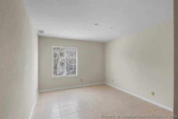 a bathroom with a sink a mirror and shower