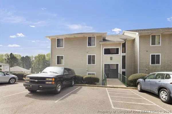 a car parked in front of a house