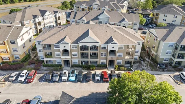 a view of multiple houses with a yard