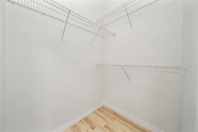 a view of a room with racks on the wall