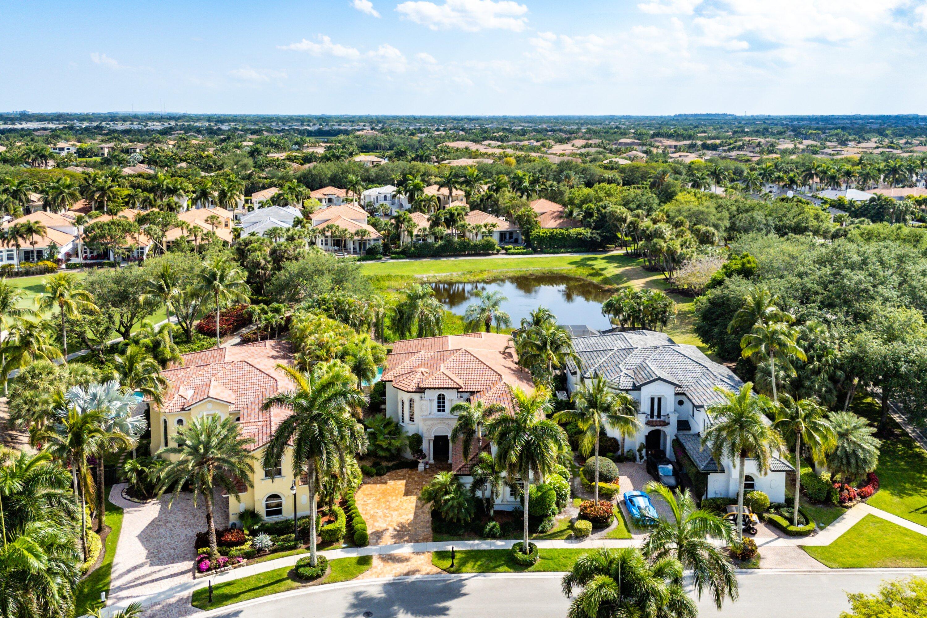 16312 Braeburn Ridge Trail Delray Beach, FL 33446 - Photo 8 of 12 an aerial view of residential houses with outdoor space and trees