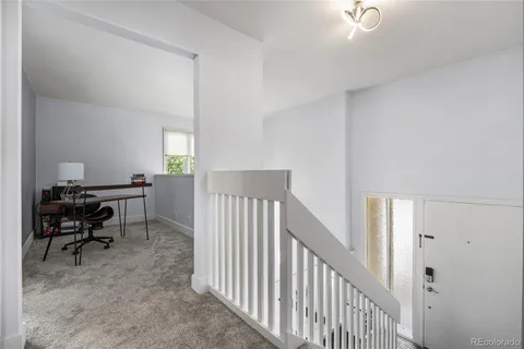 a room with furniture and a window