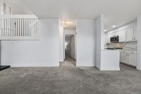 a view of a kitchen with a sink