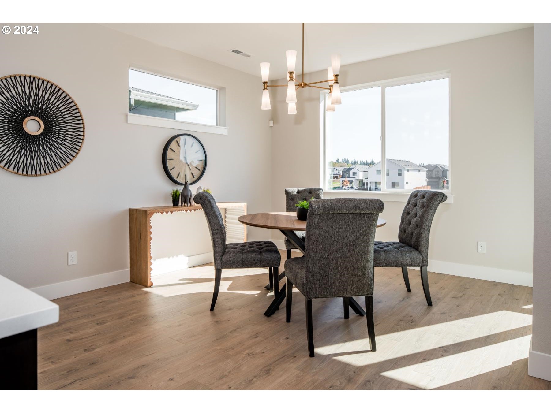 903 Northwest 178th Street Ridgefield, WA 98642 - Photo 8 of 25 a view of a dining room with furniture and chandelier