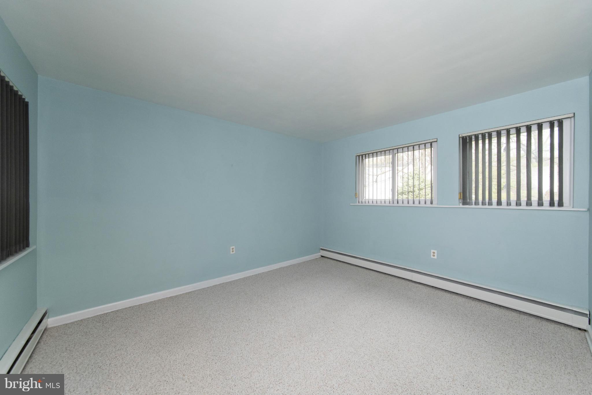 1107 Litchfield Road Baltimore, MD 21239 - Photo 17 of 30 an empty room with windows