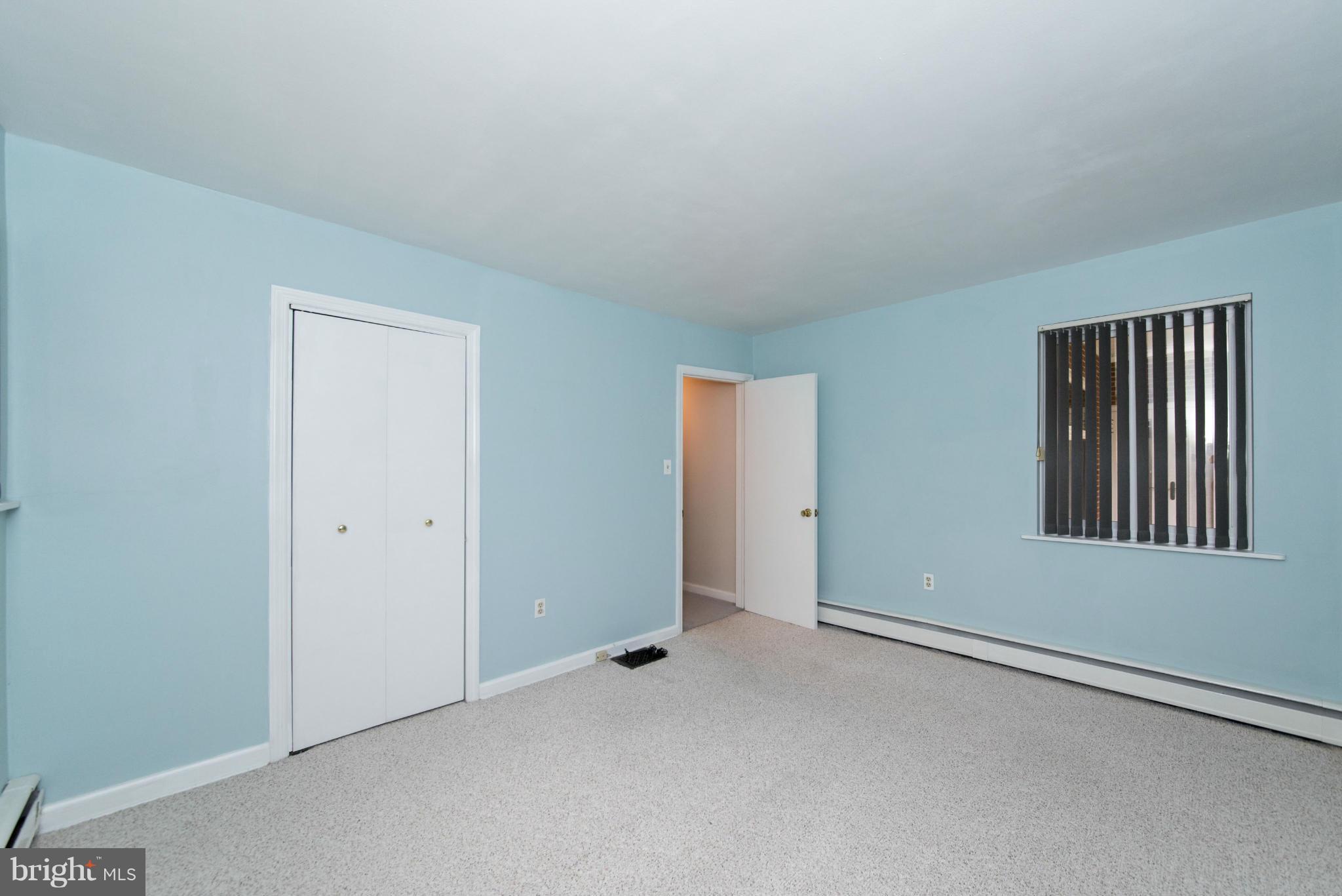 1107 Litchfield Road Baltimore, MD 21239 - Photo 18 of 30 an empty room with windows