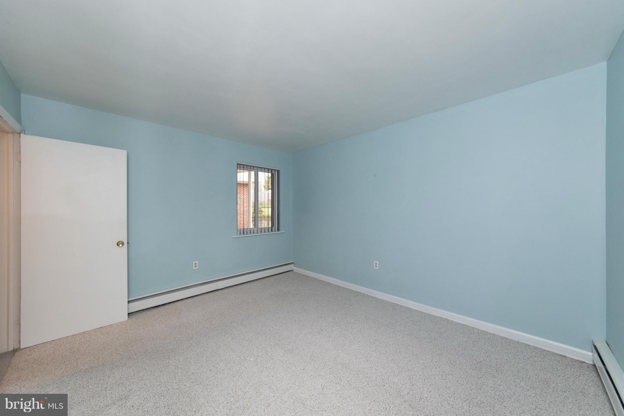 1107 Litchfield Road Baltimore, MD 21239 - Photo 19 of 30 a view of an empty room with a window