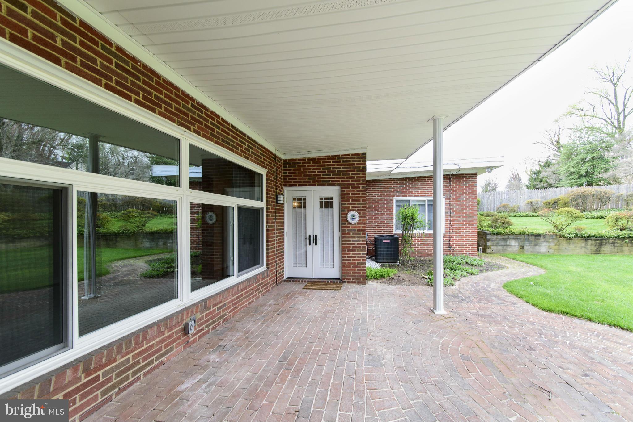 1107 Litchfield Road Baltimore, MD 21239 - Photo 27 of 30 a view of backyard with green space