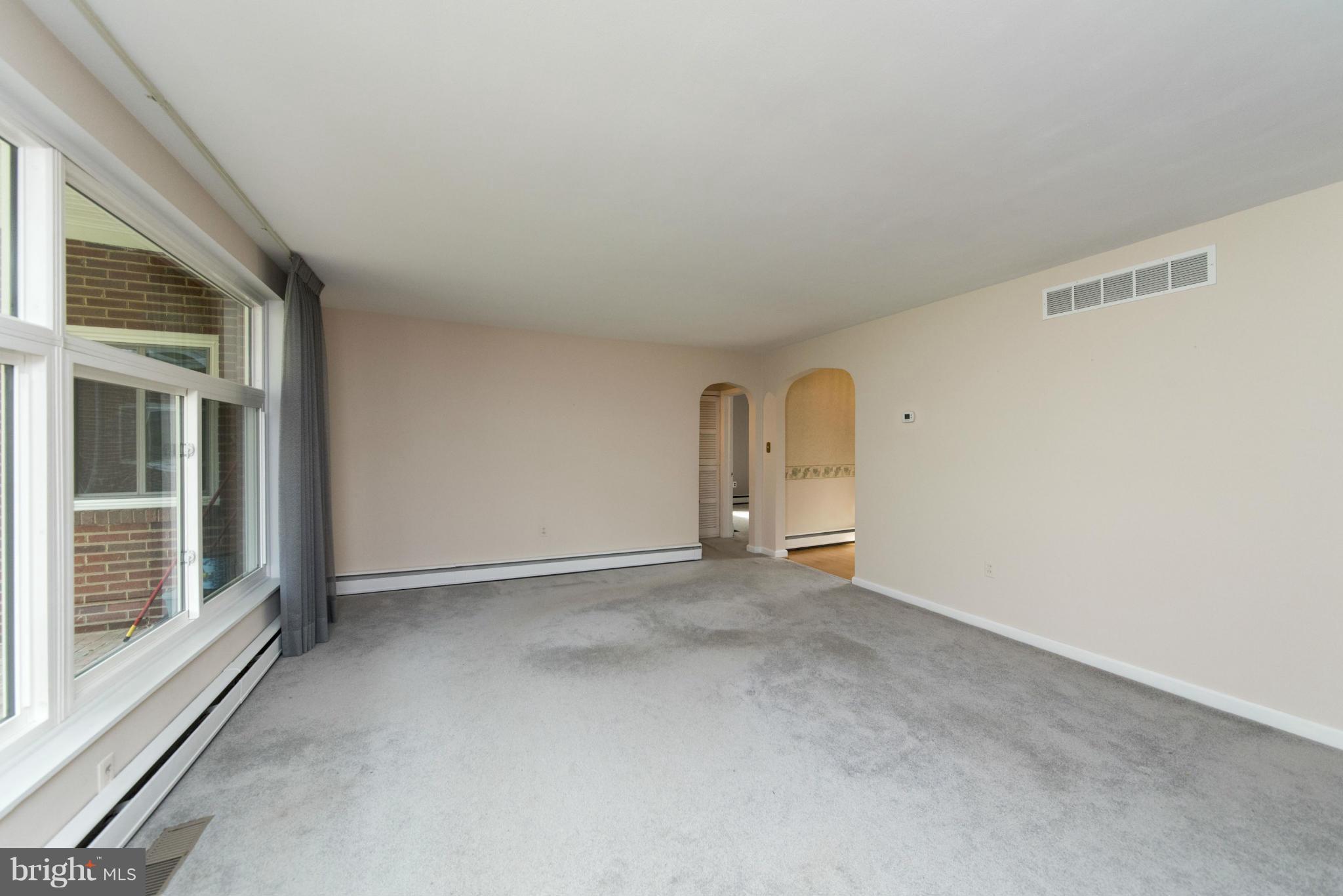 1107 Litchfield Road Baltimore, MD 21239 - Photo 5 of 30 a view of a room with a window