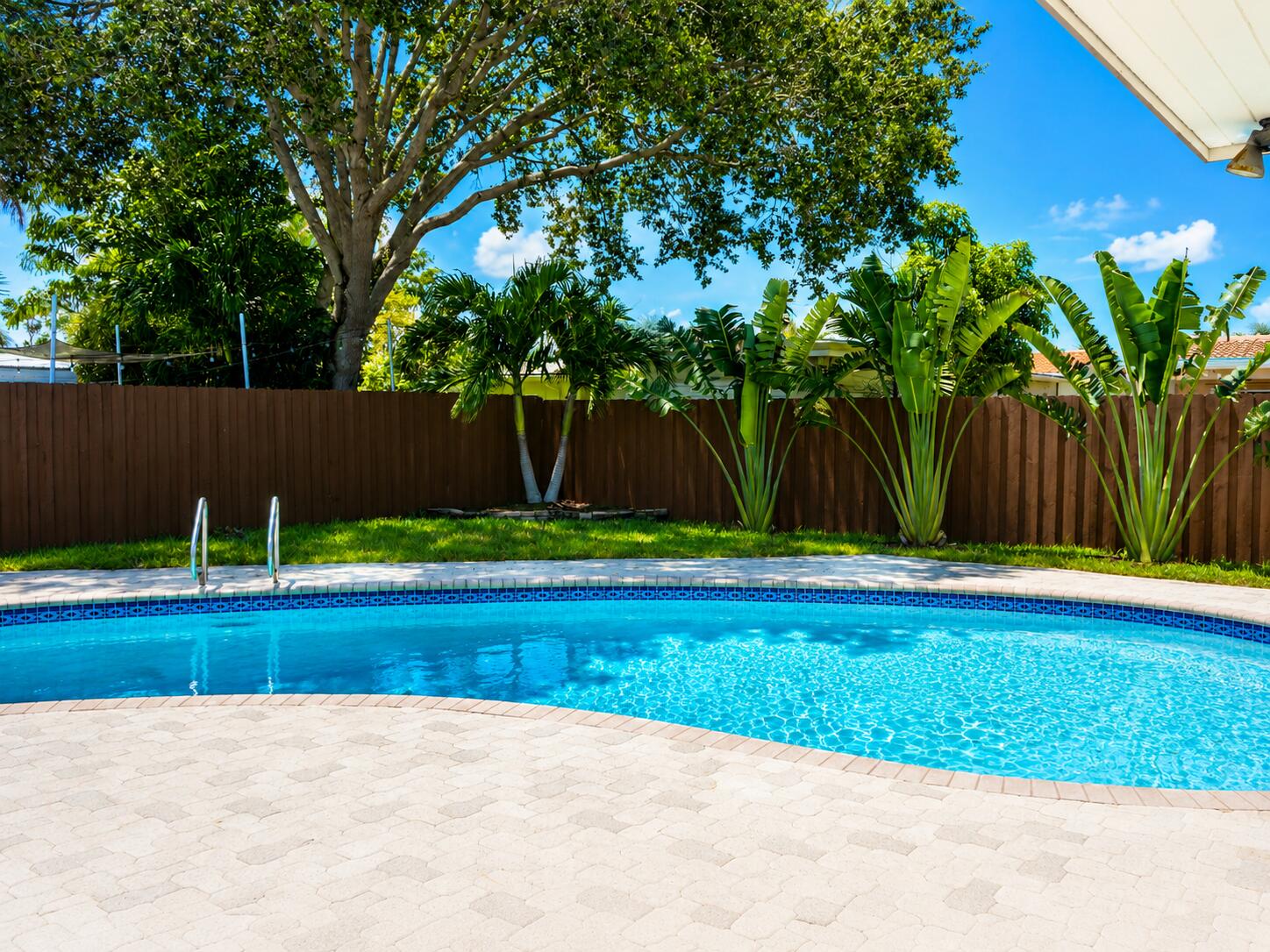 4815 Cleveland Street Hollywood, FL 33021 - Photo 26 of 31 a view of swimming pool in front of yard