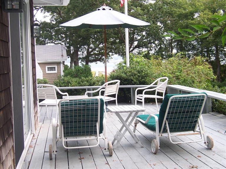 13 Bayview Road Marion, MA 02738 - Photo 8 of 12 a view of a chairs and table in the balcony