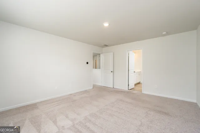 a bathroom with bathtub and shower
