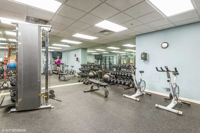 1200 West Monroe Street, Unit 619 Chicago, IL 60607 - Photo 15 of 16 a view of a room with gym equipment