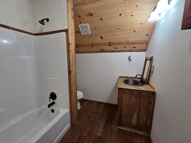 a view of a room with large windows