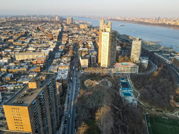 a view of a city with tall buildings