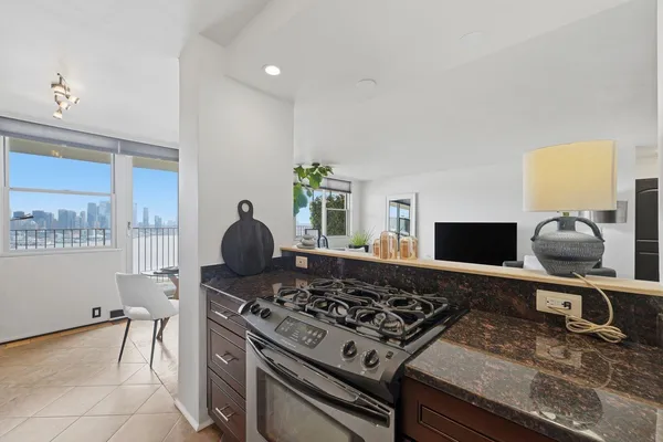 a kitchen with a stove and a sink