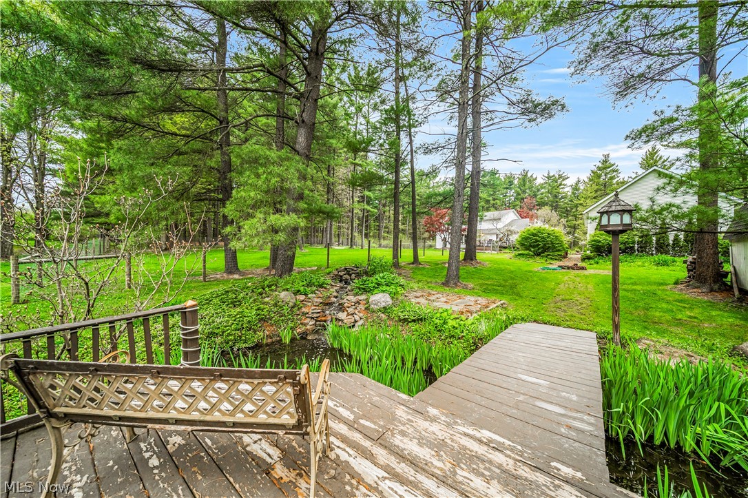 9780 Ravenna Road Chardon, OH 44024 - Photo 7 of 37 relaxing area near brook and perennial gardens
