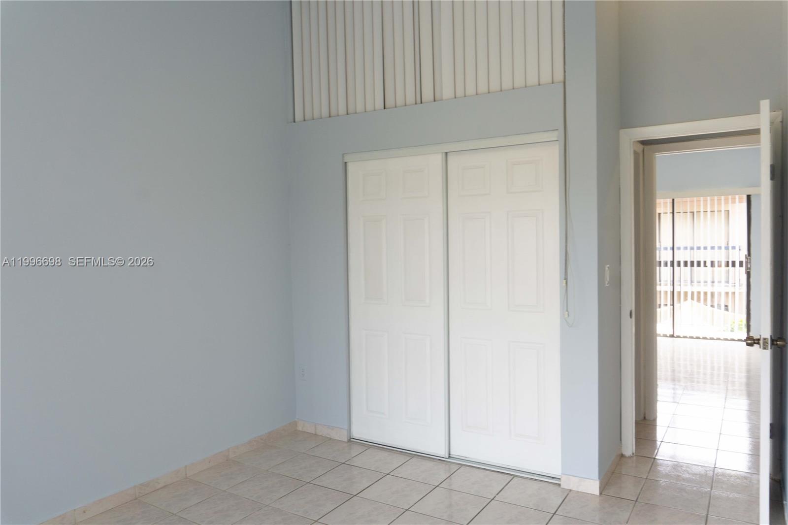 1911 Southwest 107th Avenue, Unit 1006 Miami, FL 33165 - Photo 12 of 17 a view of an empty room