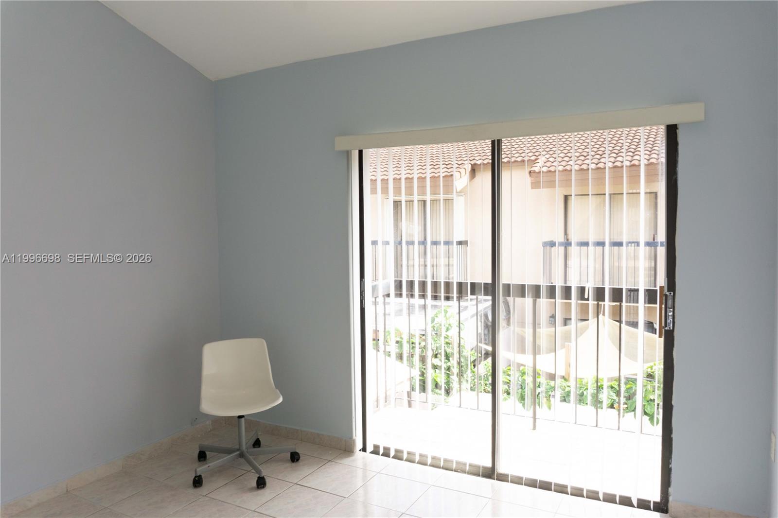 1911 Southwest 107th Avenue, Unit 1006 Miami, FL 33165 - Photo 15 of 17 a view of a room with a window