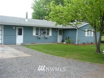 2089 East Pole Road Everson, WA 98247 - Photo 1 of 1 a front view of a house with a yard and garage