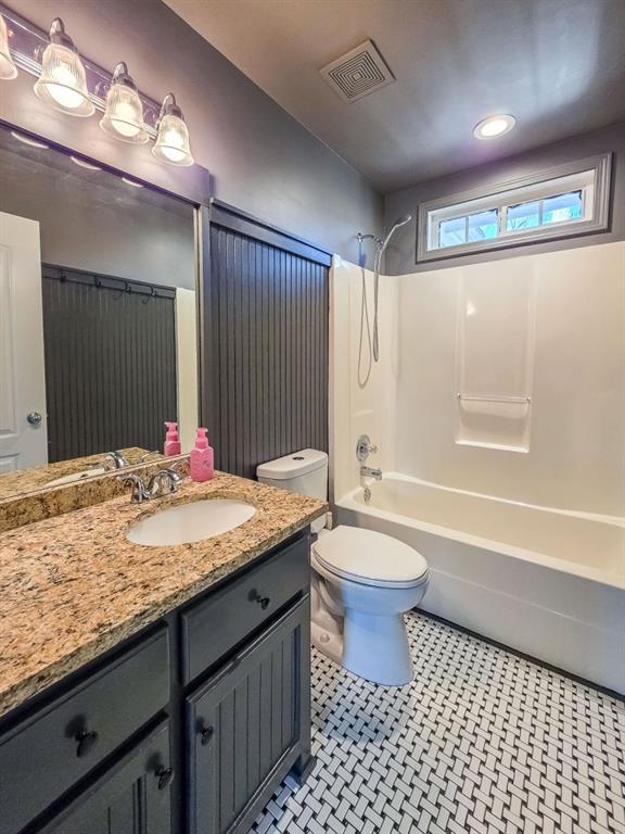 165 Horseshoe Bend Jasper, GA 30143 - Photo 25 of 44 a bathroom with a granite countertop bathtub sink vanity mirror and toilet