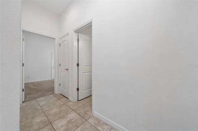 an empty room with an entryway