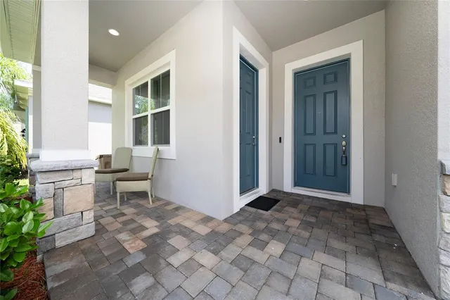 a kitchen with granite countertop a sink and a stove top oven