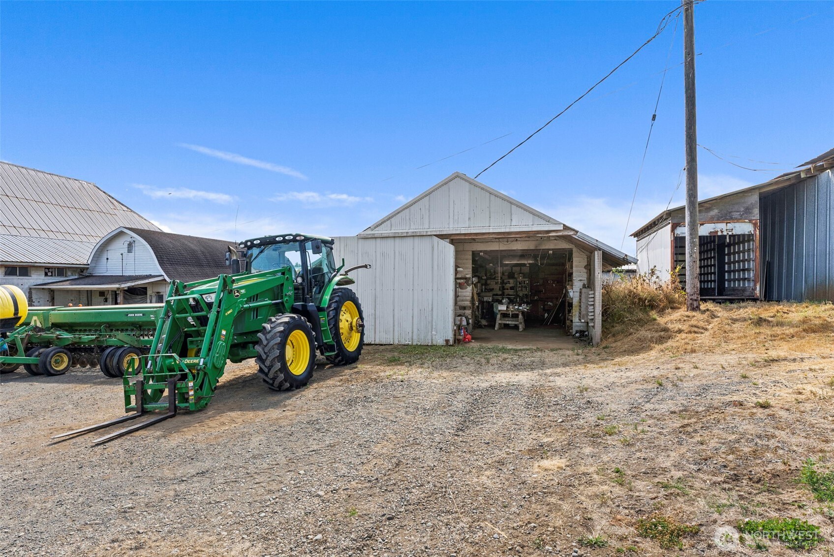 627 Wynoochee Valley Road Montesano, WA 98563 - Photo 14 of 40 a view of a house with a yard and sitting area