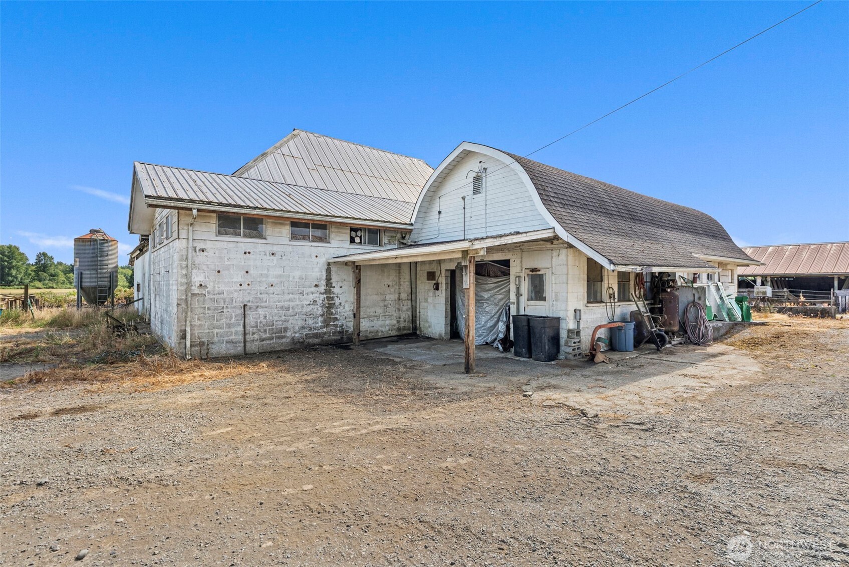 627 Wynoochee Valley Road Montesano, WA 98563 - Photo 15 of 40 a view of a house with a patio