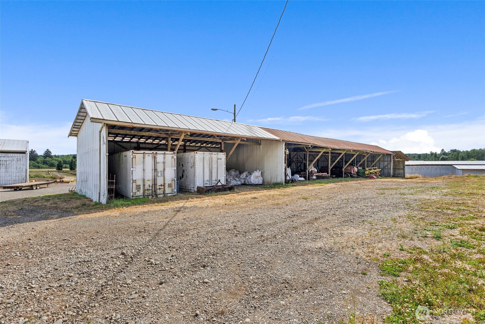 627 Wynoochee Valley Road Montesano, WA 98563 - Photo 18 of 40 a front view of a house with a yard and garage
