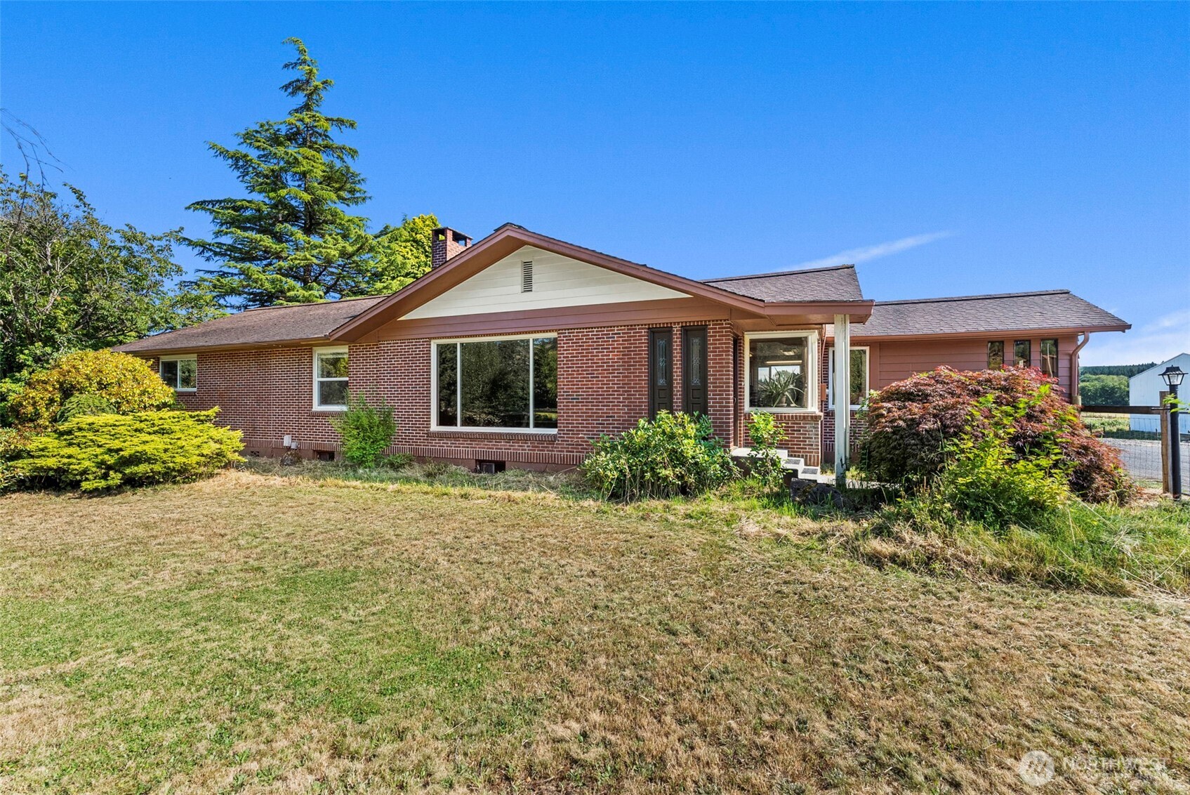 627 Wynoochee Valley Road Montesano, WA 98563 - Photo 20 of 40 a front view of a house with a yard