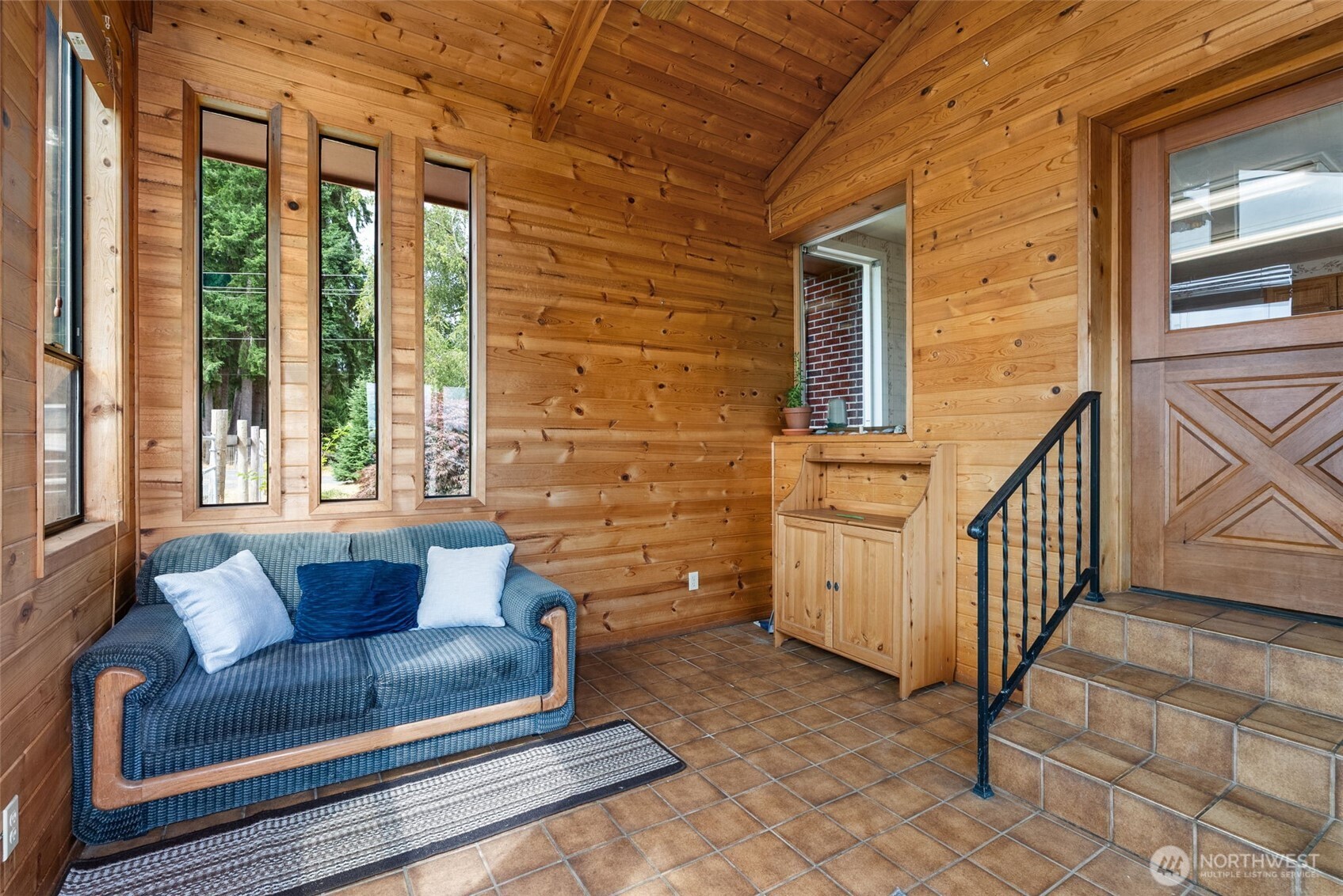 627 Wynoochee Valley Road Montesano, WA 98563 - Photo 30 of 40 a view of a house with couches and wooden floor