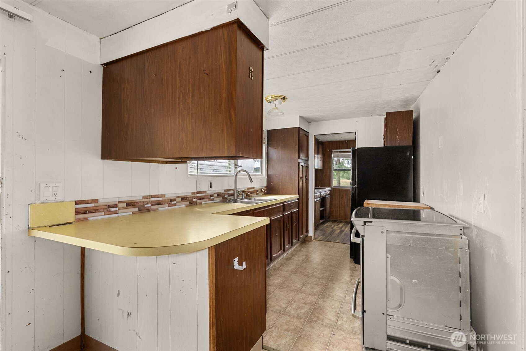 627 Wynoochee Valley Road Montesano, WA 98563 - Photo 39 of 40 a bathroom with a sink toilet and mirror