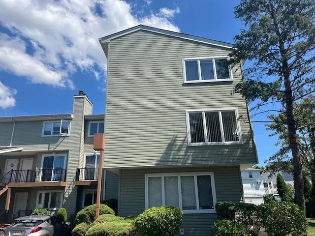 700 10th Street, Unit 12 Secaucus, NJ 07094 - Photo 11 of 13 a front view of a house with balcony